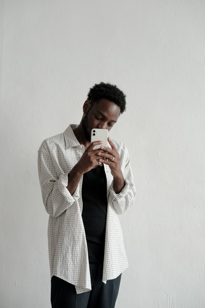 Man Taking a Photo with Smartphone