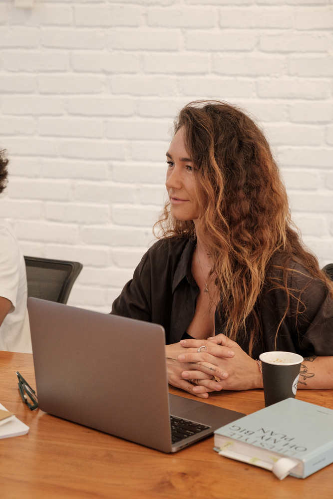Woman with Laptop in the Office